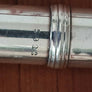Magnifique flûte traversière en argent signée Couesnon & Cie Monopole Paris, numéro 5922