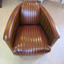 FAUTEUIL CLUB MODELE CANOE CUIR VINTAGE STYLE BATEAU ANNE DE BEJARRY