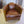 FAUTEUIL CLUB MODELE CANOE CUIR VINTAGE STYLE BATEAU ANNE DE BEJARRY